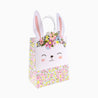 Bolsa de regalo con decorada con flores y con cara de conejo. Bolsa de regalo para pascua